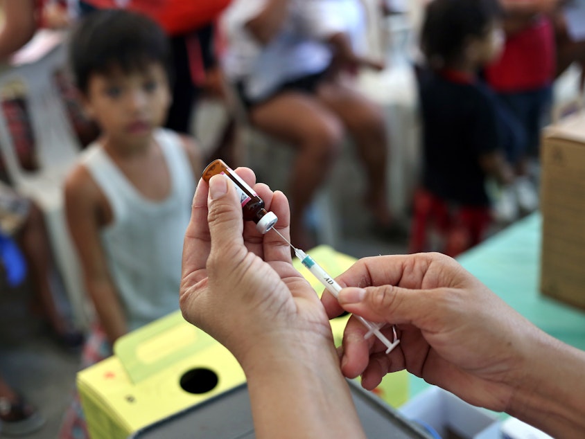 caption: A measles vaccination campaign in Manila this year. That vaccine is believed to confer an additional benefit beyond immunity to the virus. Vaccinations against other diseases — polio, tuberculosis, typhoid — may also confer an unintended protection.