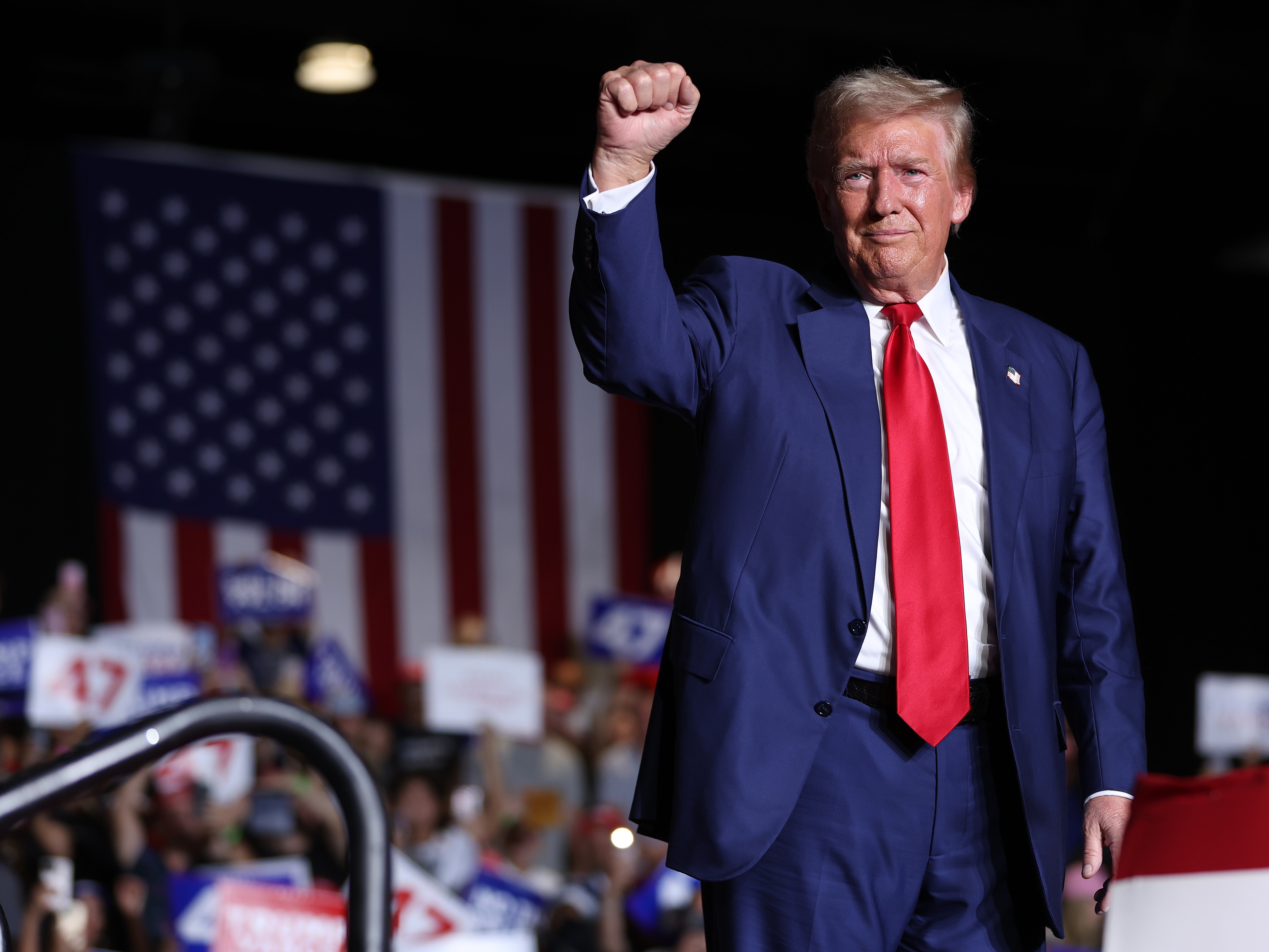 caption: The Republican presidential nominee, former President Donald Trump, greets supporters during a campaign rally in Las Vegas on Sept. 13, just two days before an apparent assassination attempt as he played golf in Florida. 