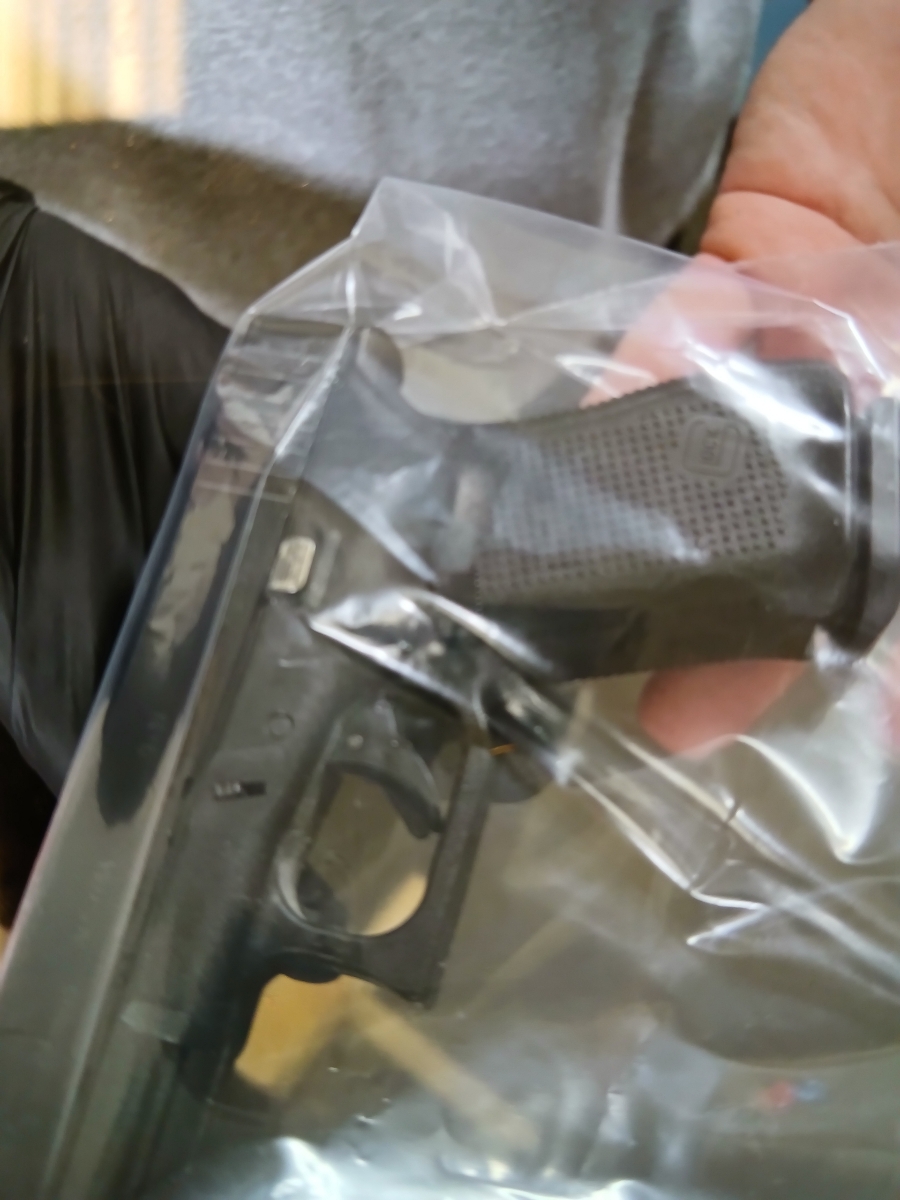 caption: A photo of the gun found over winter break in the boys' bathroom at Phantom Lake Elementary School. 