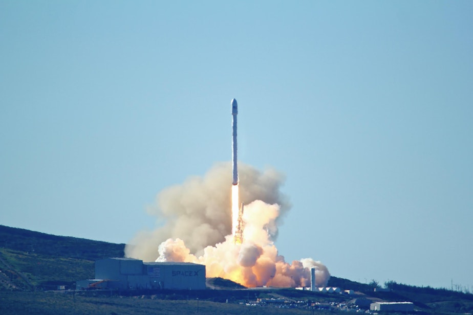 caption: Space-X's Falcon 9 rocket with 10 satellites launches at Vandenberg Air Force Base, Calif. on Saturday, Jan. 14, 2017.