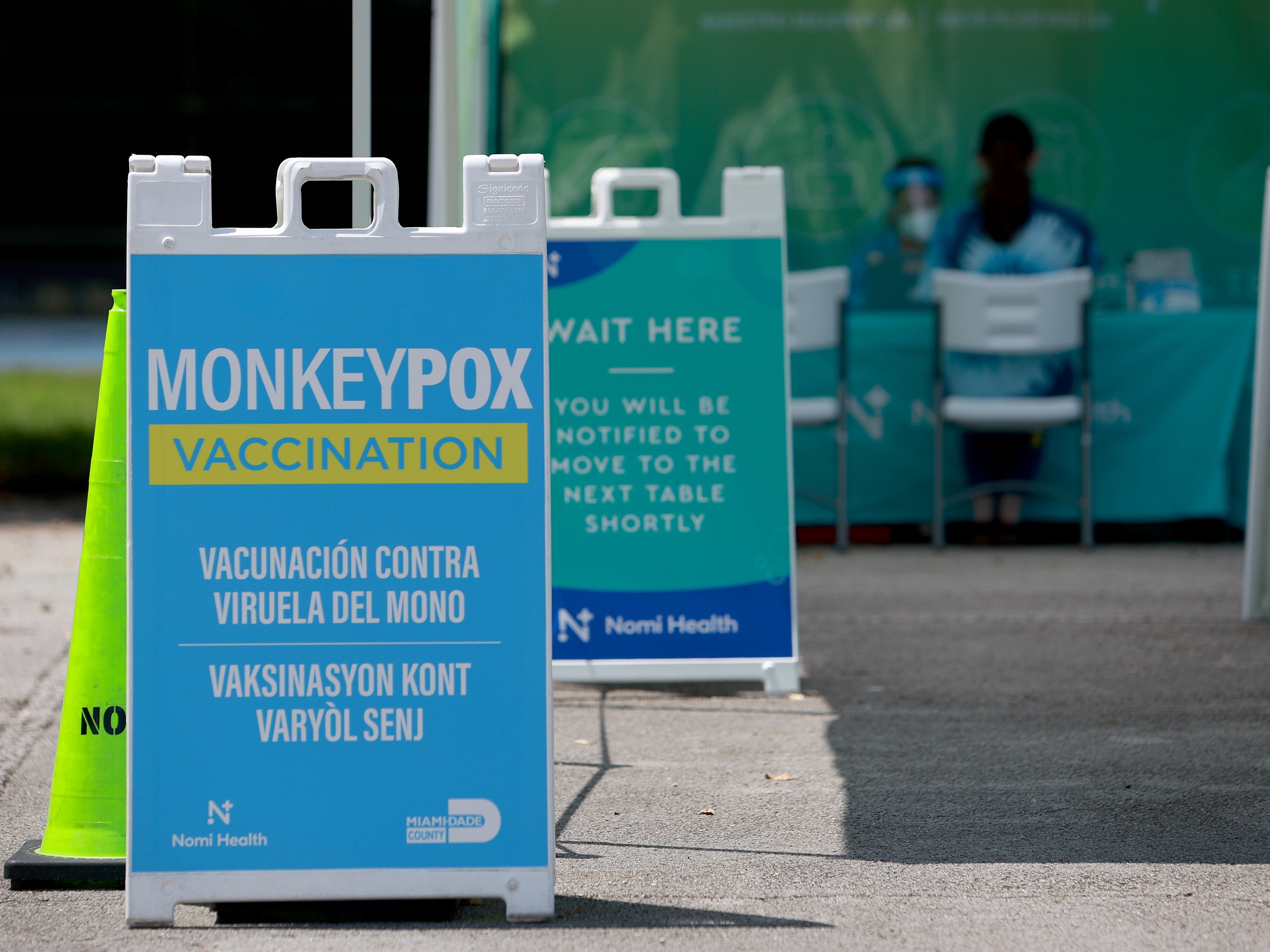 caption: In 2022, a sign in Miami, Fla., promotes "monkeypox vaccination." That same year the World Health Organization changed the name of the virus to "mpox" since the animals that transmit it to humans are rodents and small mammals, not monkeys, and because of the stigma carried by the term "monkey."