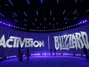 caption: The Activision Blizzard Booth during the Electronic Entertainment Expo in Los Angeles.