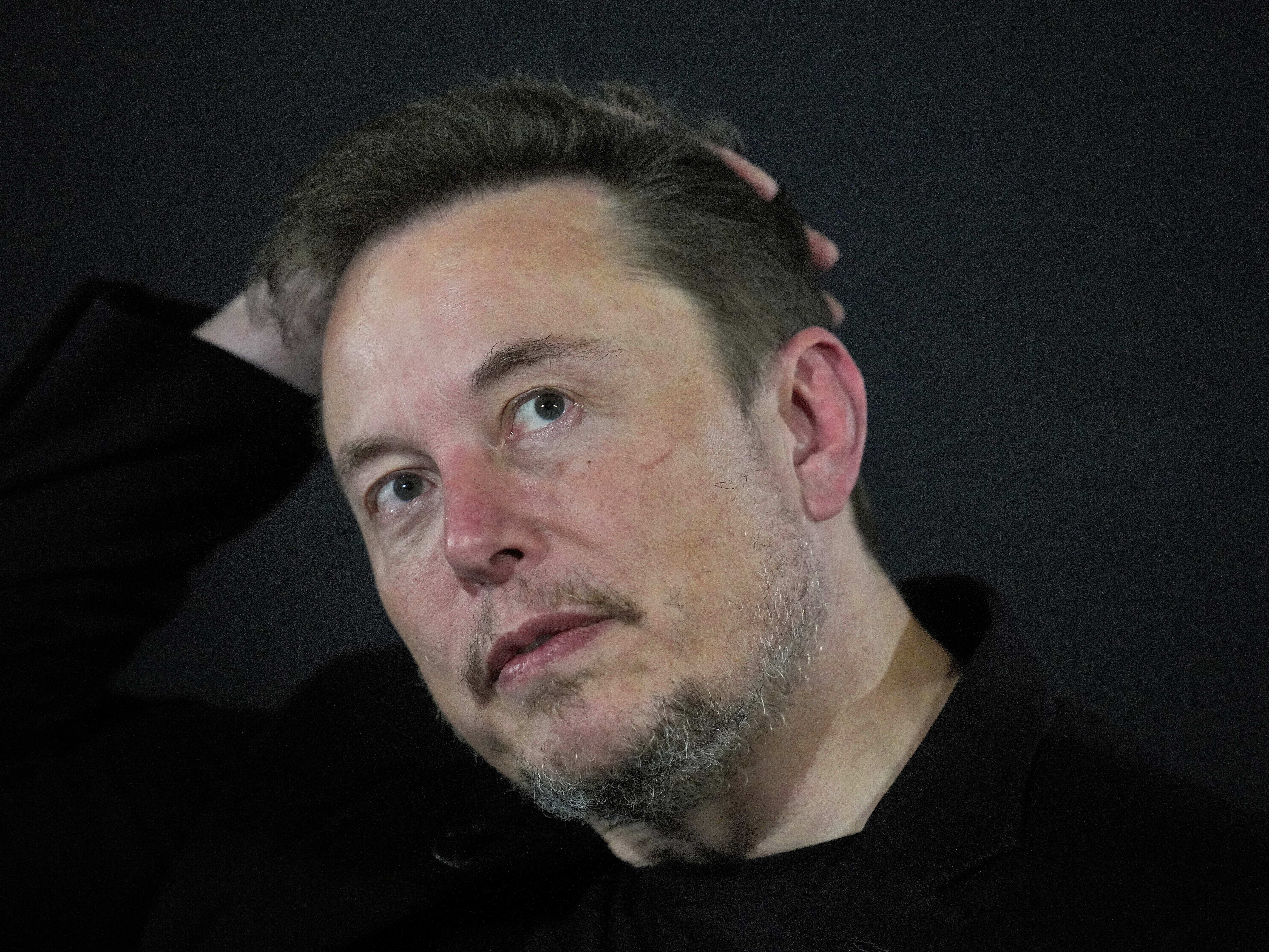 caption: Elon Musk appears at an event in London, on Nov. 2, 2023. A Brazilian Supreme Court justice included Musk as a target in an ongoing investigation over the dissemination of fake news and opened a separate investigation late April 7, into the executive for alleged obstruction.