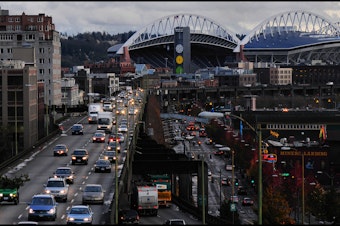 caption: The Alaskan Way Viaduct sends cars streaming past Seattle's waterfront.