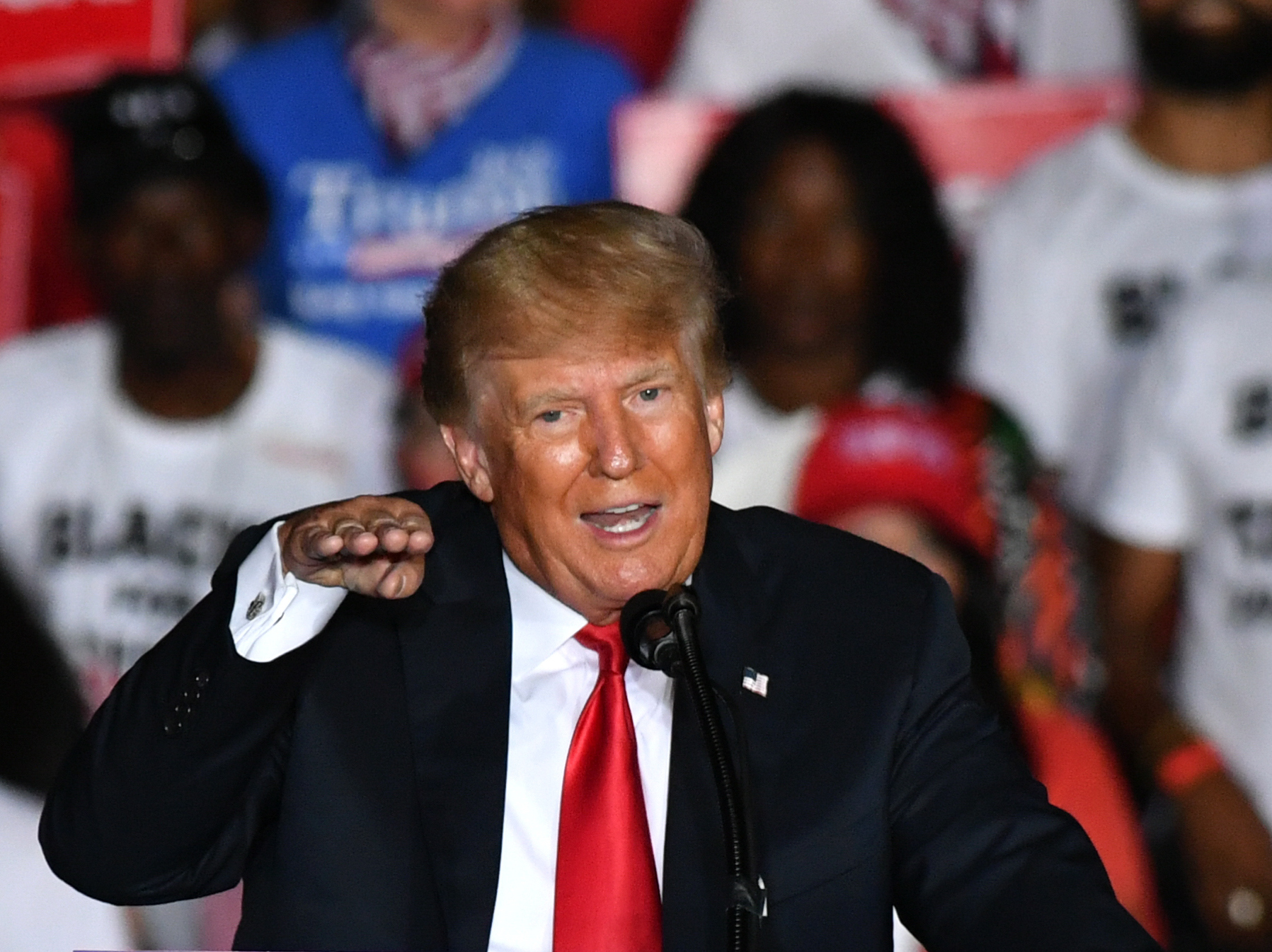 caption: Former President Donald Trump holds a Save America rally in Perry, Ga., in September. Trump is unlikely to take falling off the Forbes 400 wealthiest Americans in stride.