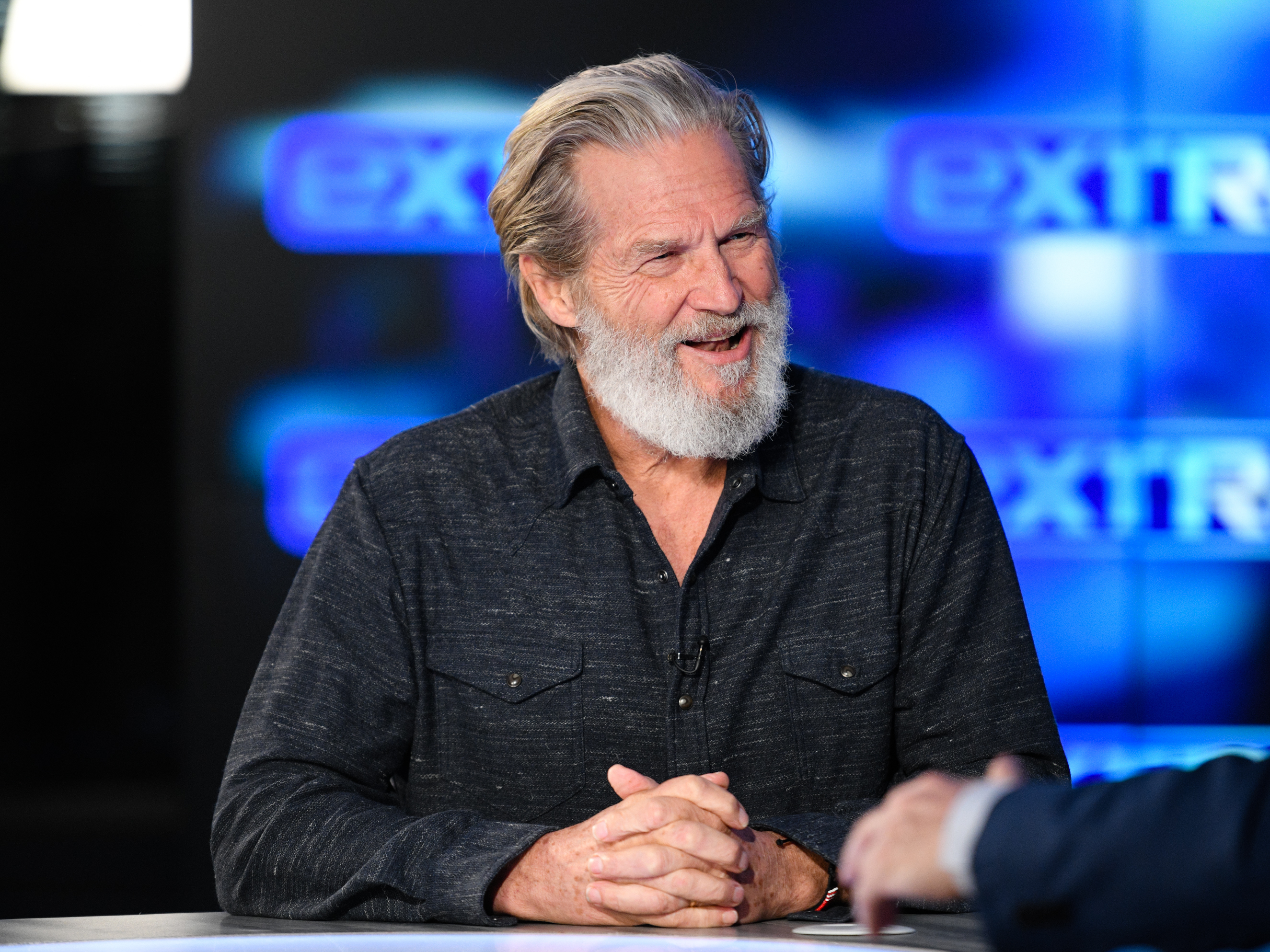 caption: Jeff Bridges visits "Extra" at Burbank Studios on Dec. 13, 2019 in Burbank, Calif.
