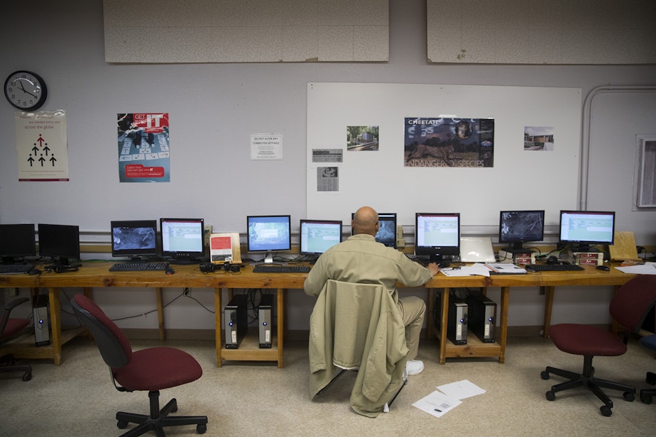 caption: Greg Steen, an incarcerated individual at the Clallam Bay Corrections Center, looks for 'Hollywood' or 'Facebook' clips of wildlife on Thursday, January 30, 2019, on the Olympic Peninsula. 