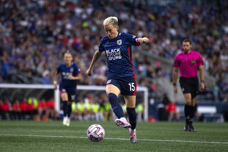 caption: OL Reign forward Megan Rapinoe drives toward the goal in the second half of her final NWSL regular-season home game against the Washington Spirit on Friday, Oct. 6, 2023, at Lumen Field in Seattle.