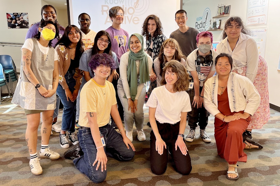 caption: The 2023 spring RadioActive Advanced Producers and staff. Top row from left: Leila M'Baye, Idrissa Gaye, Hayden Andersen, Dash Pinck, and Colin Yuen. Middle row: Nina Tran, Anjali Einstein, Eva Solorio, Sadeen Al Ziyad, Ada Walther, Gideon Hall, and Terina Papatu. Front row: Antonio Nevarez, Jennifer Wing, and Dayana Capulong. Not pictured: Lily Turner and Kelsey Kupferer.