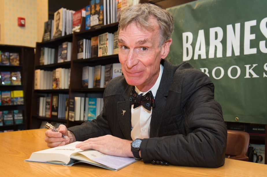 caption: Bill Nye, here signing books in New York, says he loves you, Vashon, but you're wrong.