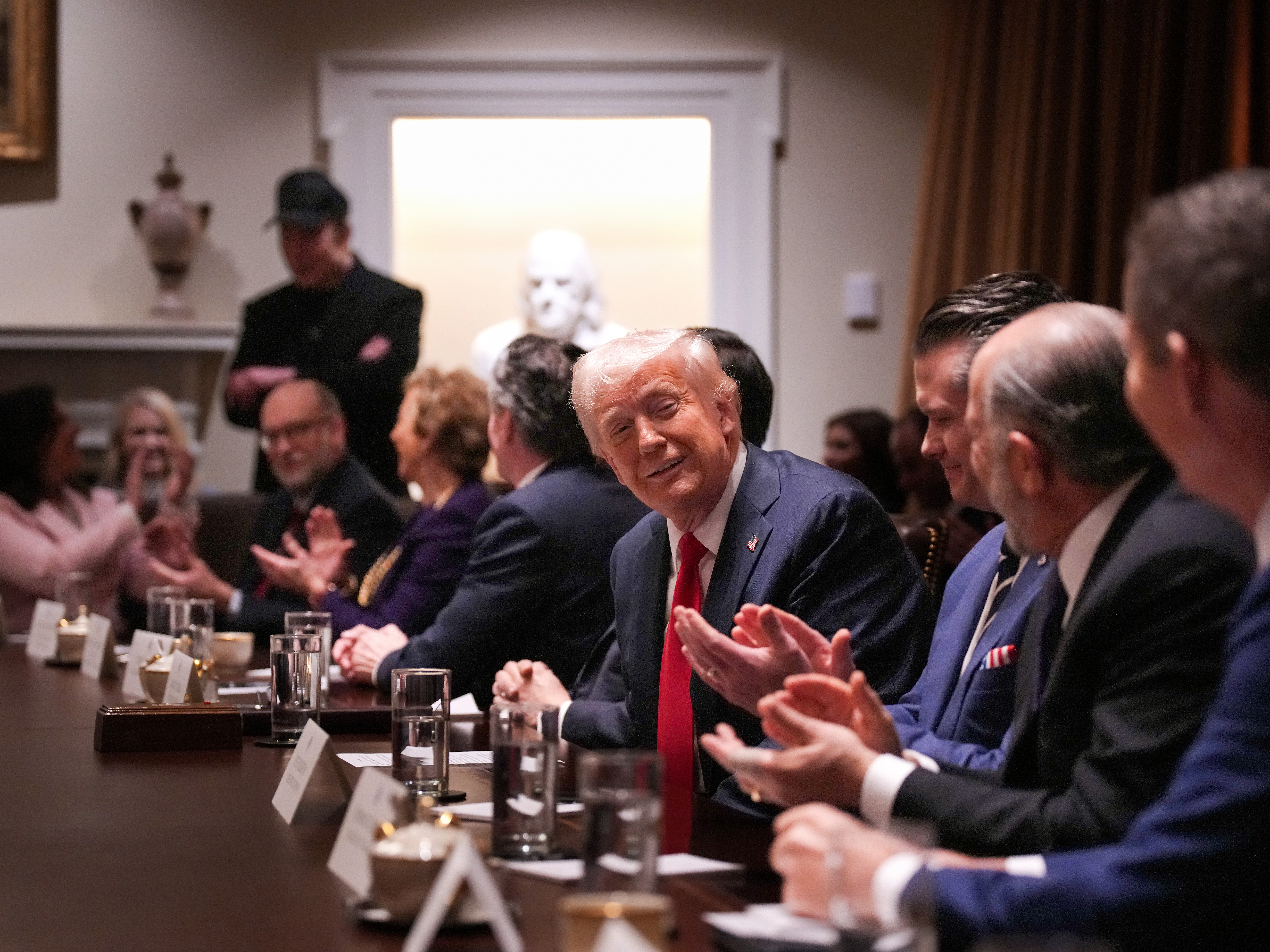 caption: President Trump delivers remarks during his first Cabinet meeting of his second term at the White House on Feb. 26, in Washington, D.C. The meeting includes Tesla and SpaceX CEO Elon Musk, head of a Trump administration team called the Department of Government Efficiency.