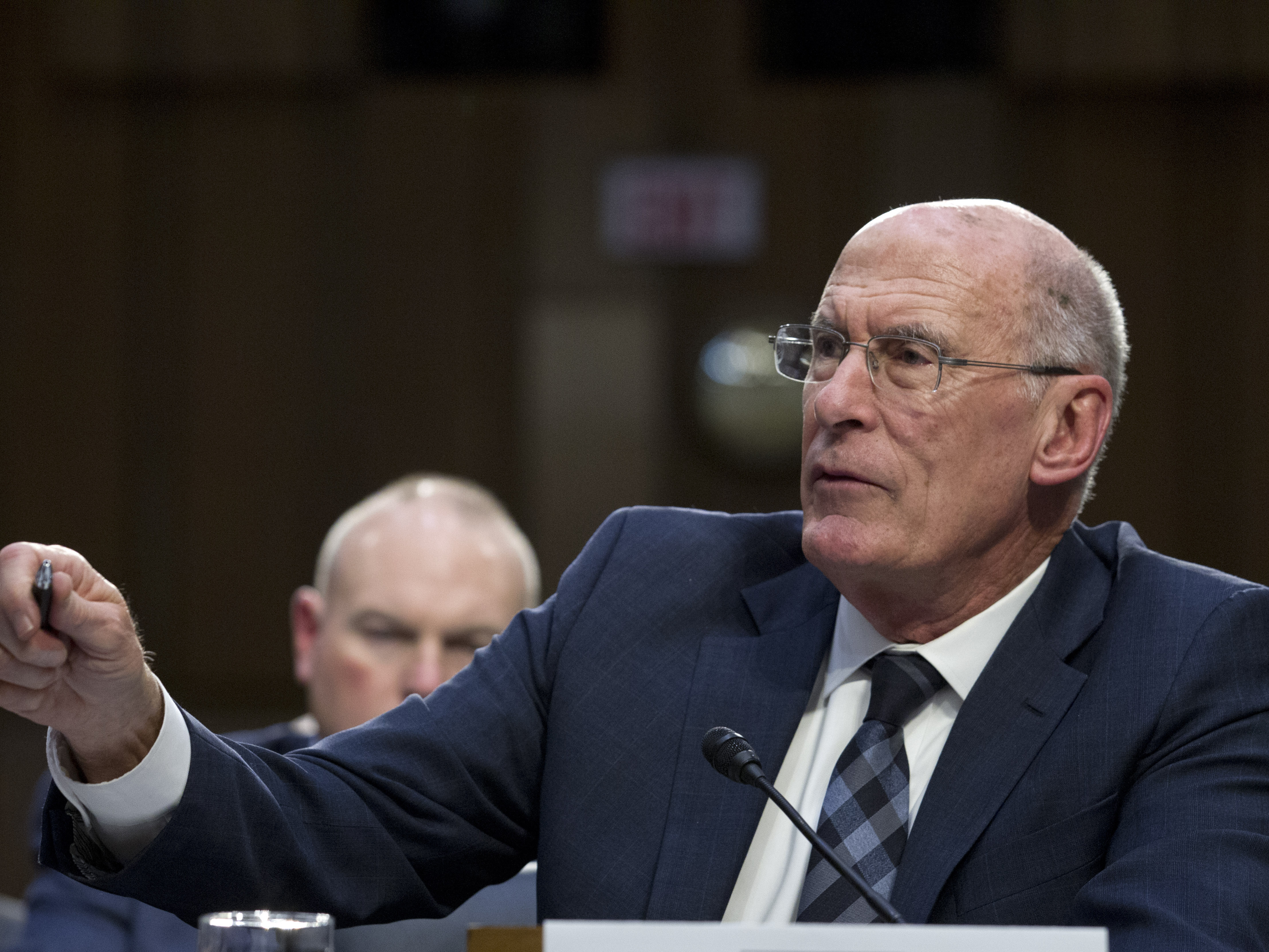caption: Director of National Intelligence Dan Coats testifies before the Senate Intelligence Committee in January. Coats often operated behind the scenes, but when he spoke publicly, his assessments were often at odds with President Trump