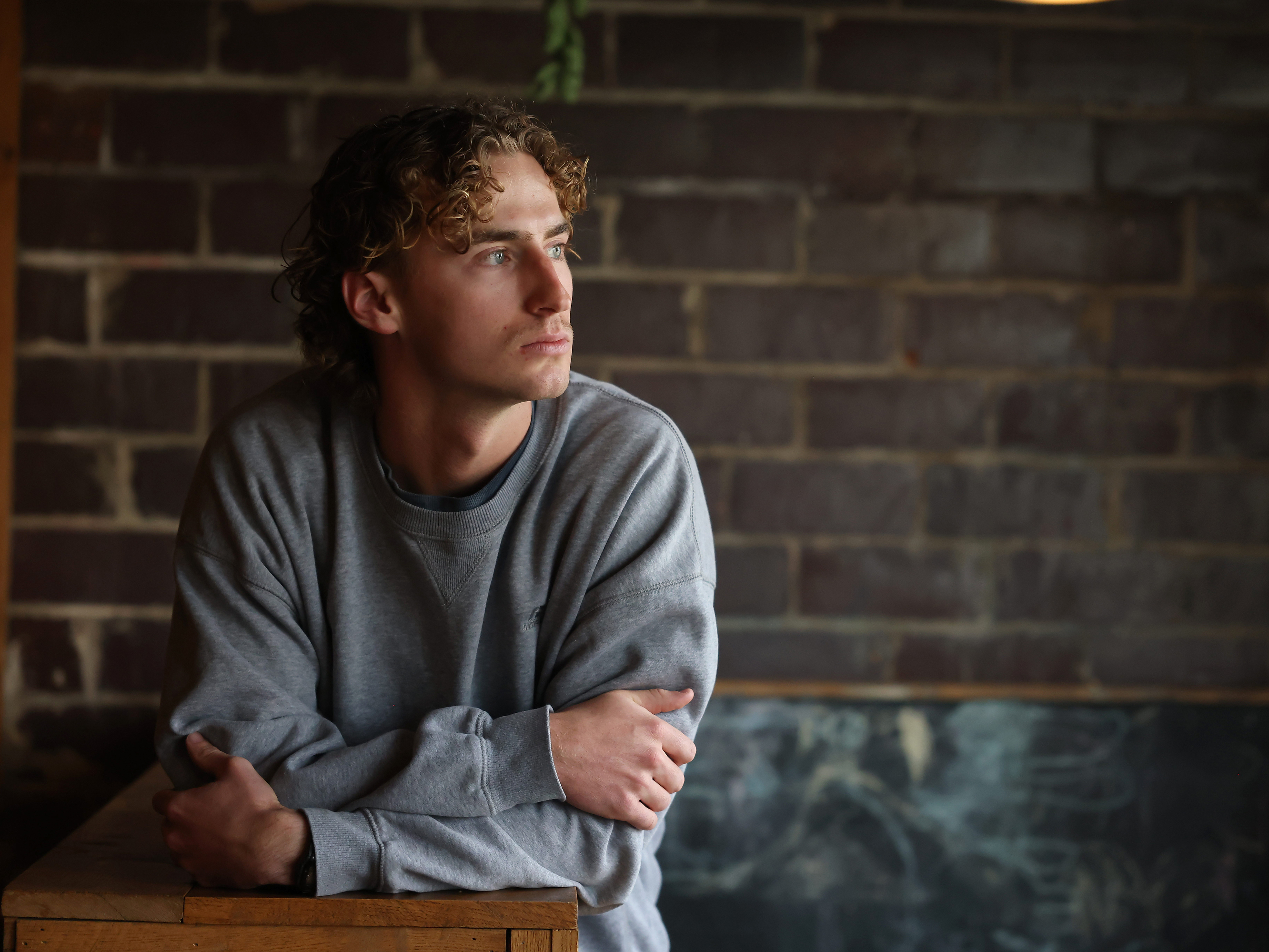 caption: Carter King, a student at Dordt University, a Christian college in Sioux Center, Iowa on Nov. 7, 2023.