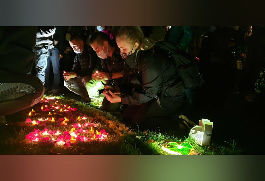 caption: A vigil near the federal courthouse in downtown Seattle, following an announcement about the Breonna Taylor case in Kentucky, Sept. 23, 2020. 