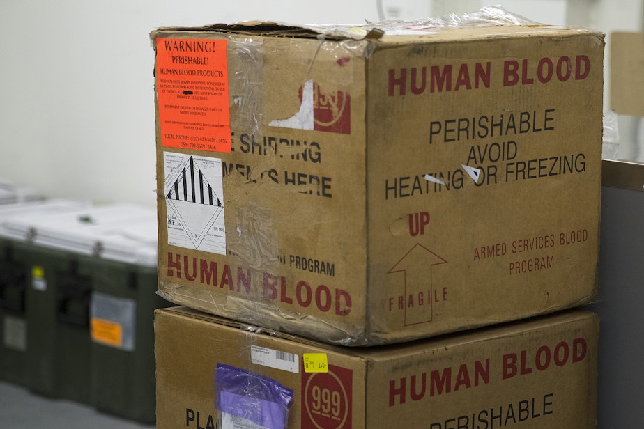 caption: Boxes of human blood are stacked inside the laboratory area of the military field hospital inside CenturyLink Field Event Center on Sunday, April 5, 2020, in Seattle. The 250-bed hospital for non COVID-19 patients was deployed by U.S. Army soldiers from the 627th Army Hospital from Fort Carson, Colorado, as well as soldiers from Joint Base Lewis-McChord. 