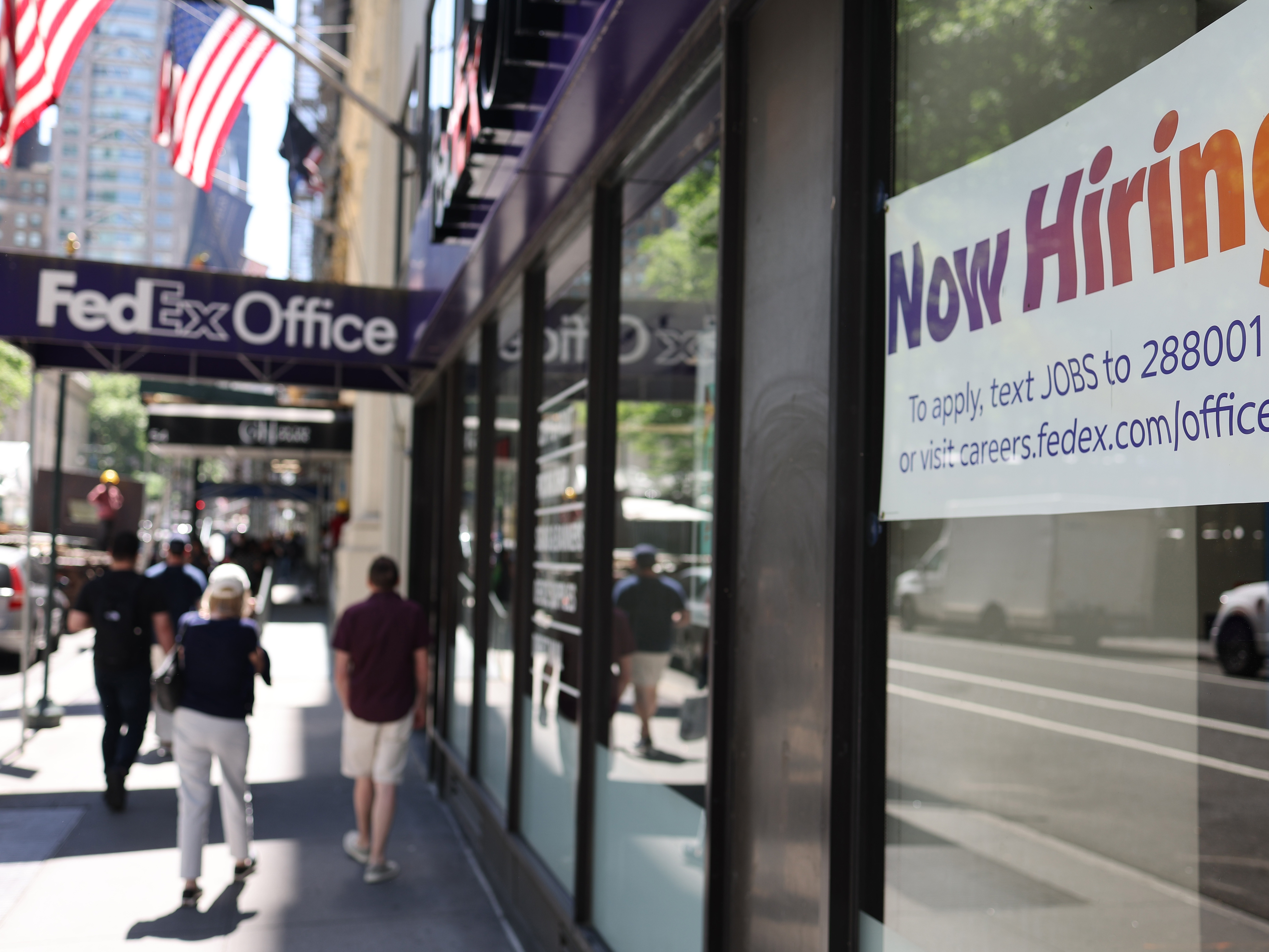caption: U.S. employers added 147,000 jobs in June. Job gains for April and May were revised up by a total of 16,000 jobs.