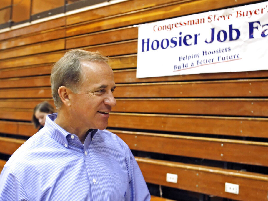 caption: Then-Rep. Stephen Buyer, R-Ind., talks in 2010 during a job fair in Lafayette, Ind. The former U.S. congressman is among nine people charged Monday in four separate and unrelated insider trading schemes.