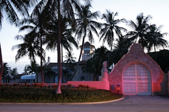 caption: The entrance to former President Donald Trump's Mar-a-Lago Palm Beach, Fla. estate is shown on Aug. 8, 2022, the day of the FBI's search there.