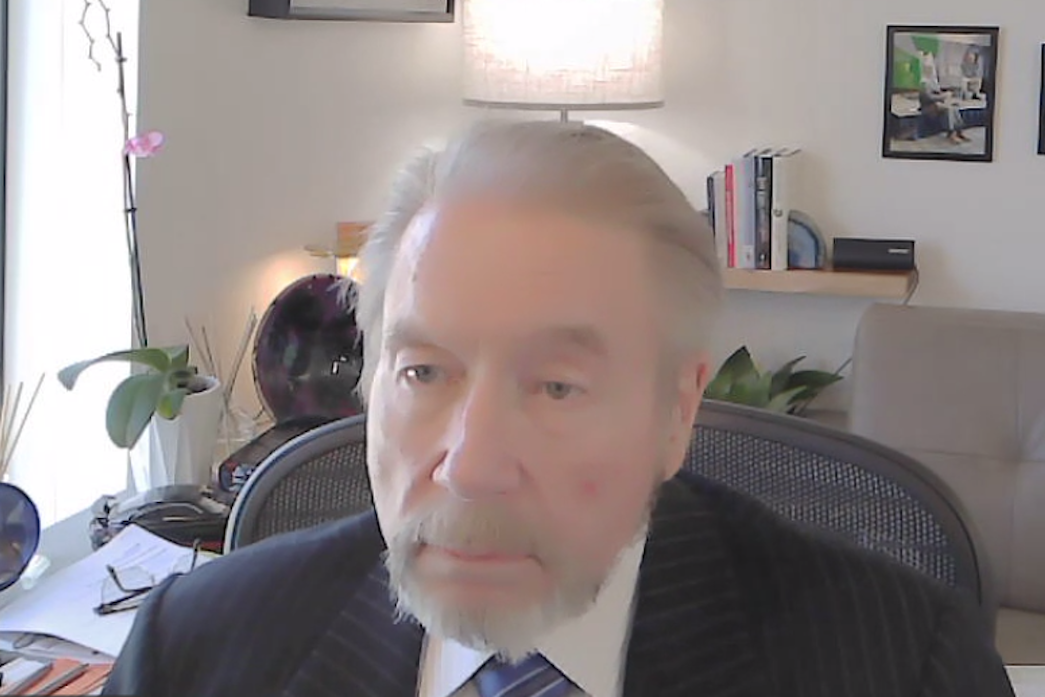 caption: King County Assessor John Arthur Wilson on Zoom on July 7, 2025, during a hearing regarding a restraining order filed against him by Lee Keller.