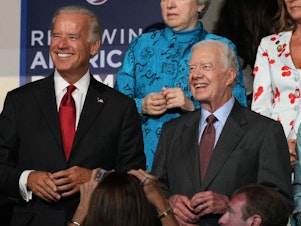 caption: Then-Sen. Joe Biden is seen with former President Jimmy Carter watching the proceedings at the Democratic National Convention in Denver in 2008 where Biden would be the party's vice presidential nominee.