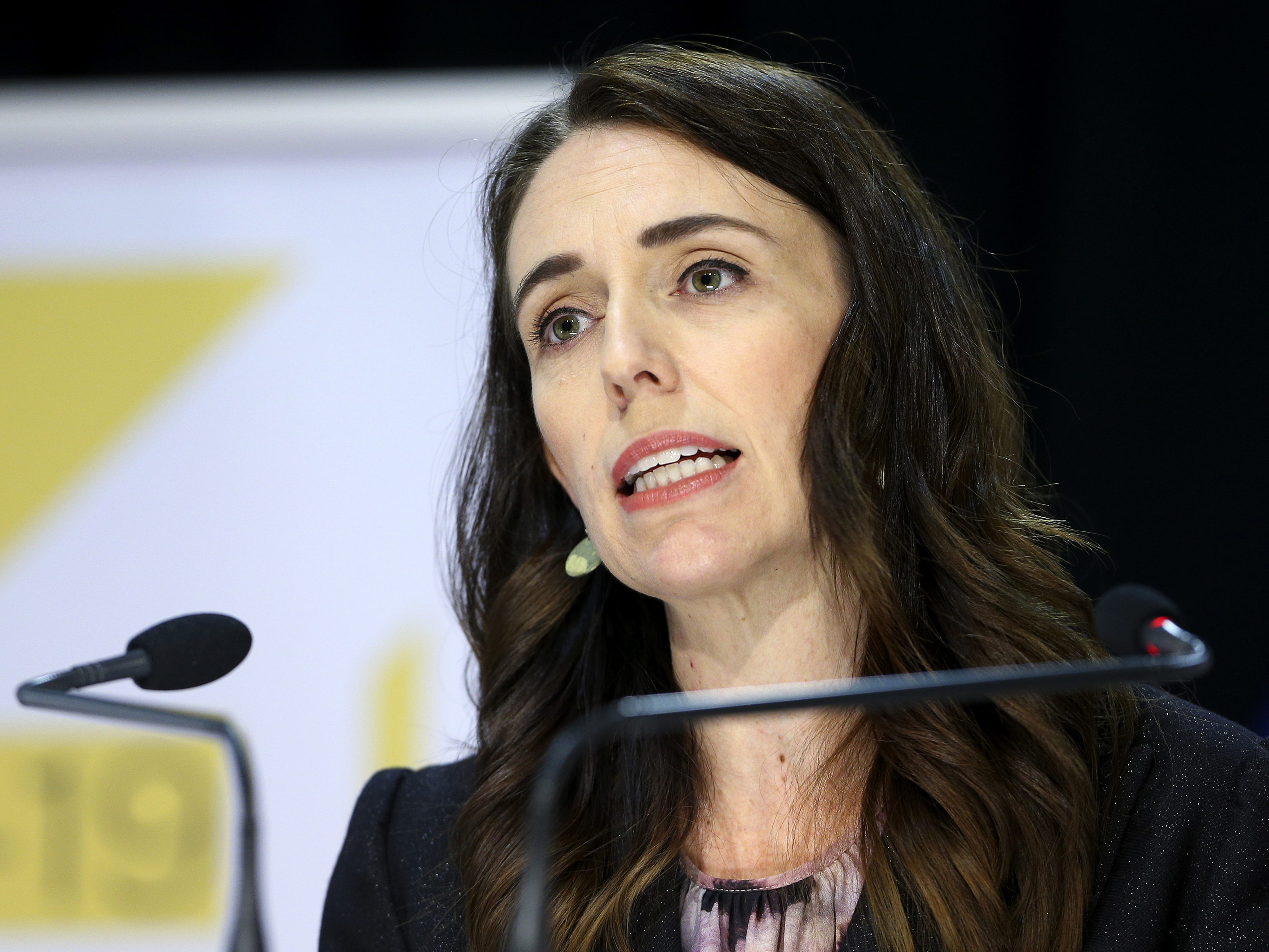 caption: New Zealand Prime Minister Jacinda Ardern, seen here in May, said Tuesday that the country had four new cases of COVID-19. The government moved quickly to contain the outbreak and increased alert levels throughout the country.