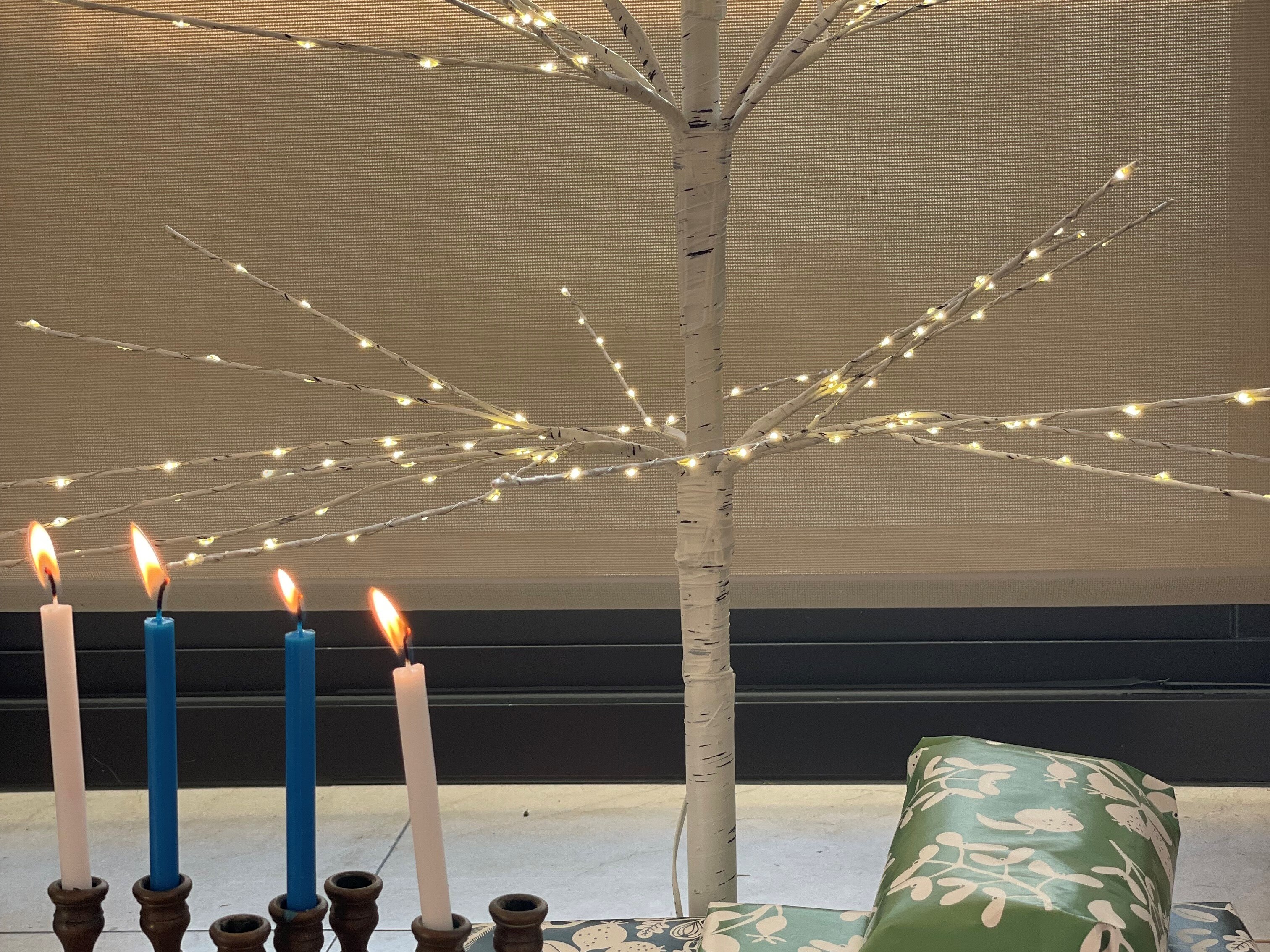 caption: Scott Simon's Christmas tree and Hanukkah candles.