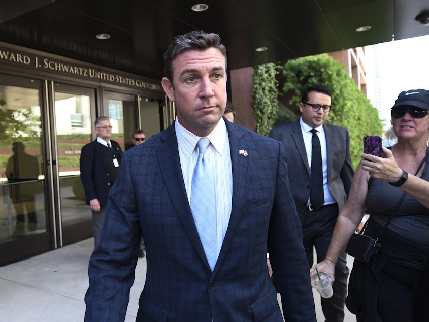 caption: Rep. Duncan Hunter, R-Calif., leaves federal court after a hearing last October.