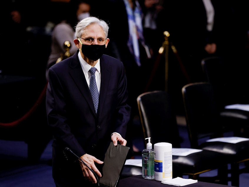 caption: Judge Merrick Garland arrives to testify before a Senate Judiciary Committee hearing on his nomination to be attorney general on Capitol Hill on Monday.