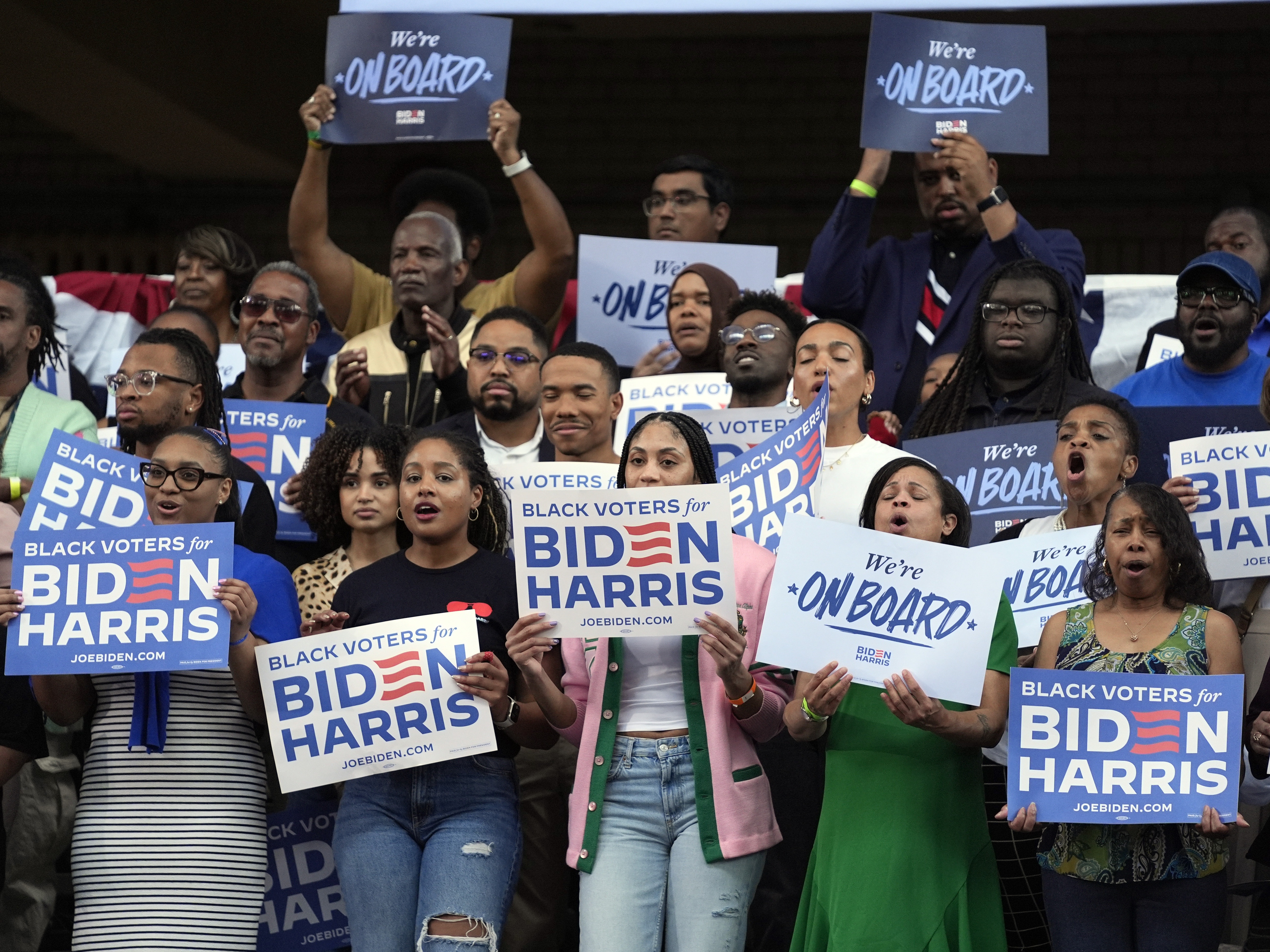 caption: Supporters listen as President Biden speaks during a Black Voters for Biden campaign event at Girard College, Wednesday, May 29, in Philadelphia. Biden won Black voters under 45 with around 80% in 2020. In a recent University of Chicago poll, that support is more of a question in 2024. 