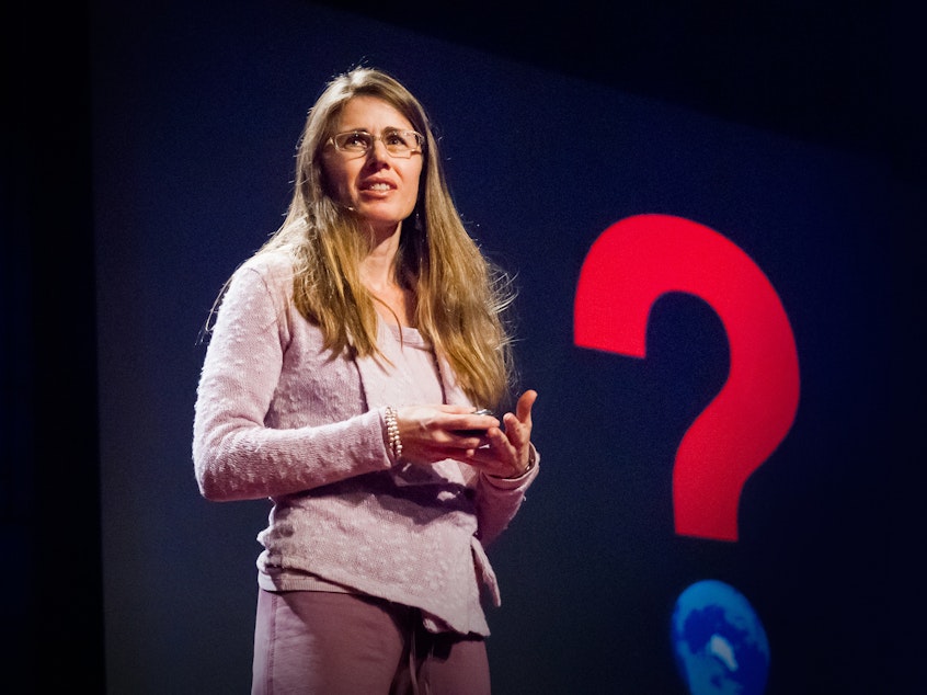 caption: Laura Trice on the TED stage.
