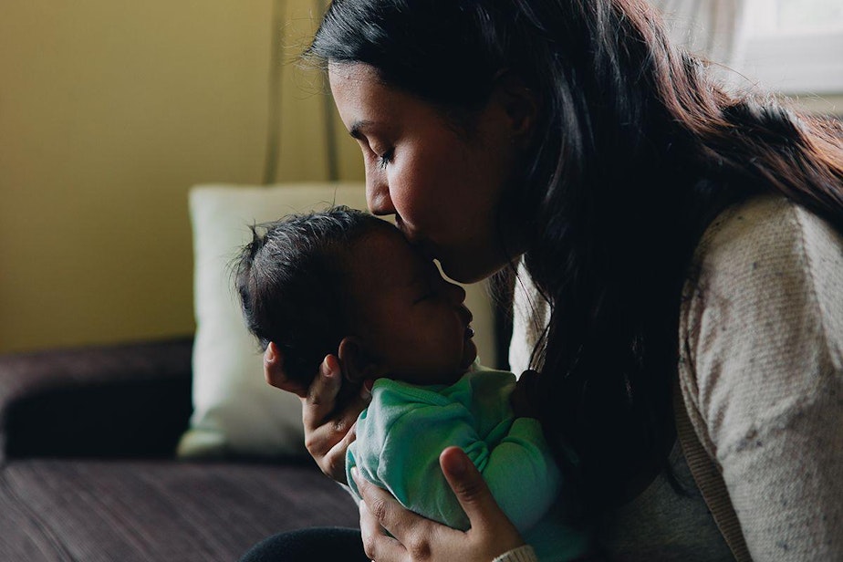 caption: Sofia Voz Ford of Rainier Beach after nursing her baby, Vivian.