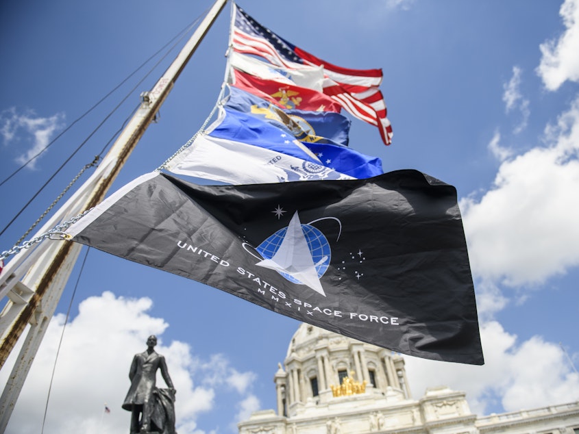 caption: A United States Space Force flag flies along with flags of other armed service branches. The Space Force announced on Friday that the University of Puerto Rico at Mayagüez has joined its University Partnership Program.