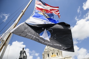 caption: A United States Space Force flag flies along with flags of other armed service branches. The Space Force announced on Friday that the University of Puerto Rico at Mayagüez has joined its University Partnership Program.
