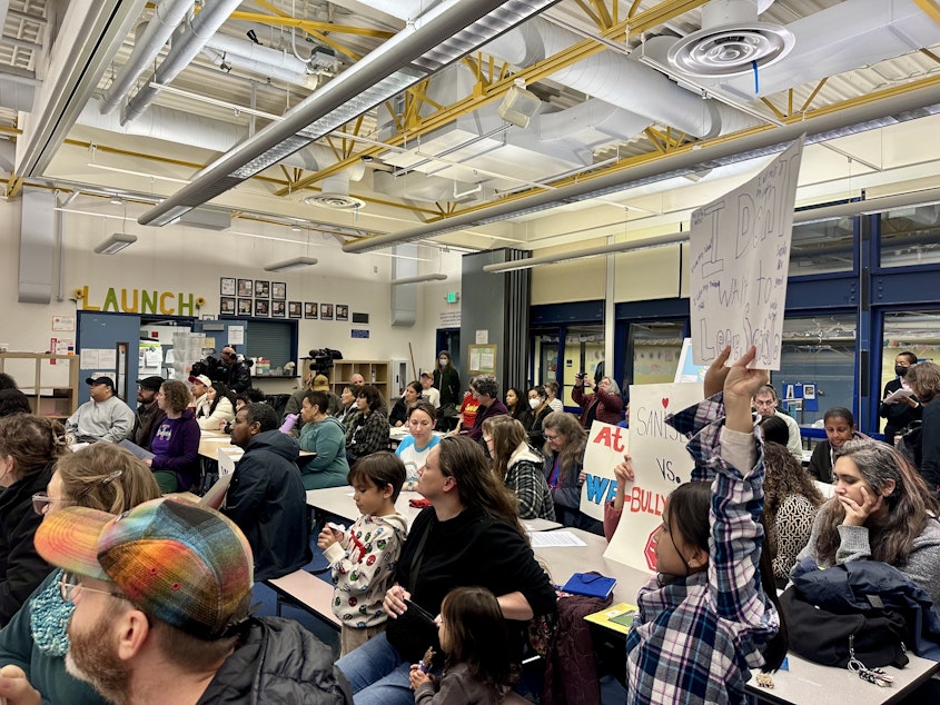 caption: More than 50 parents, students, and community members attended a closure community meeting Tuesday at Sanislo Elementary in West Seattle.