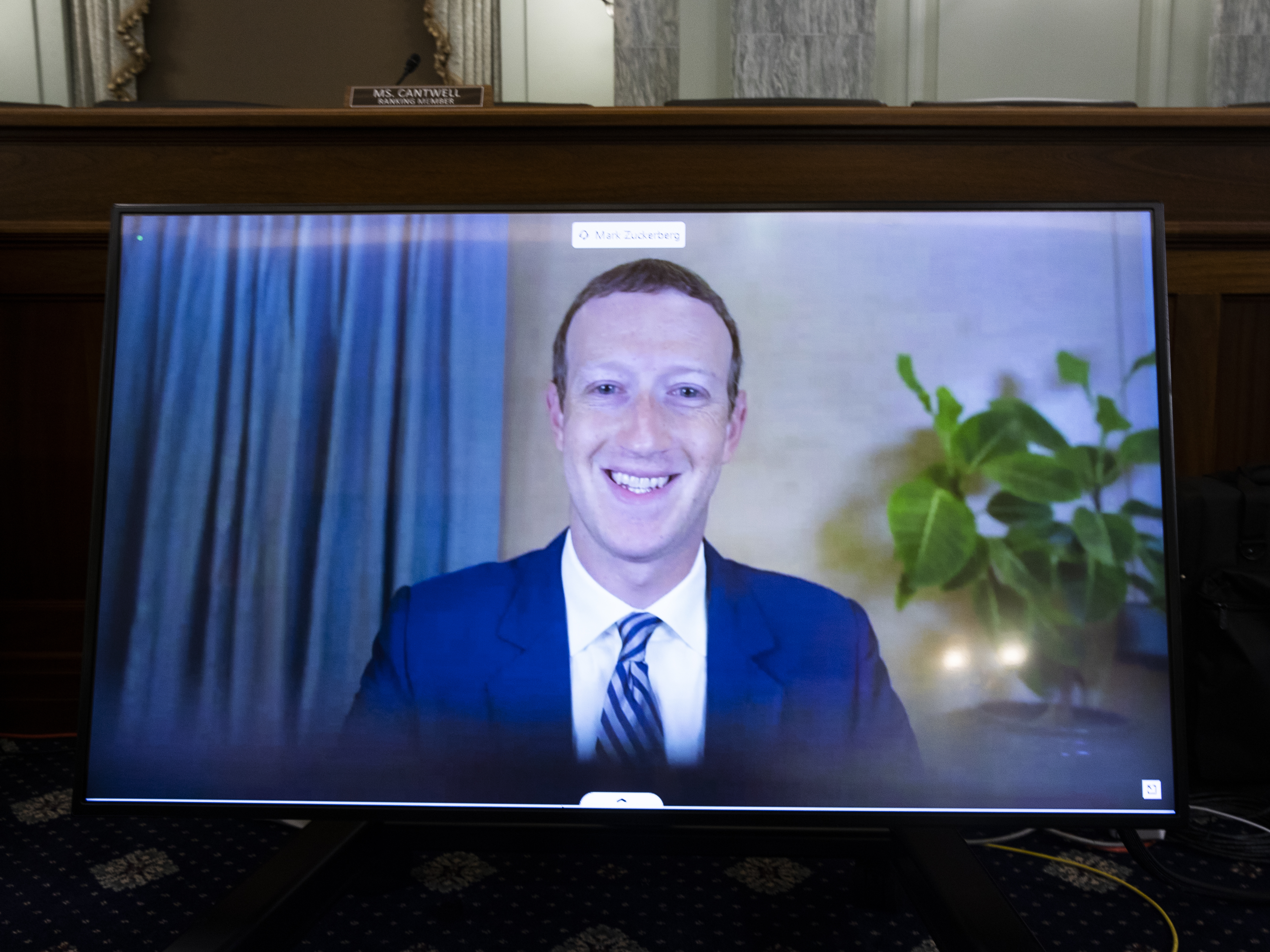 caption: Facebook CEO Mark Zuckerberg testifies remotely during a Senate Commerce, Science, and Transportation Committee hearing on October 28, 2020.