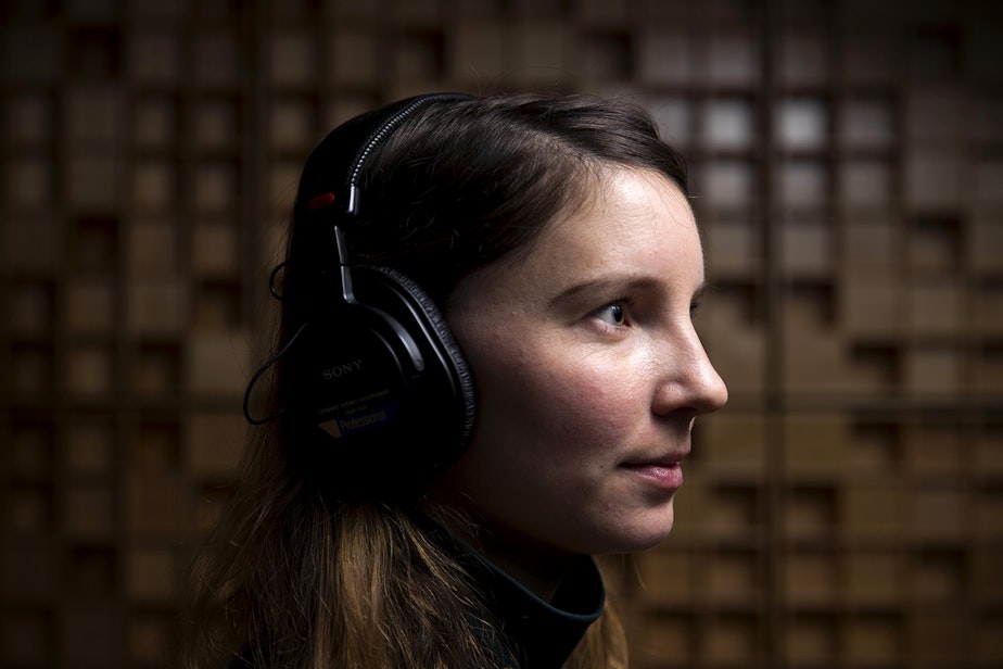 caption: Caroline Gomez is part of KUOW's AudioShop, a podcast lab. She listens to podcasts all. the. time.