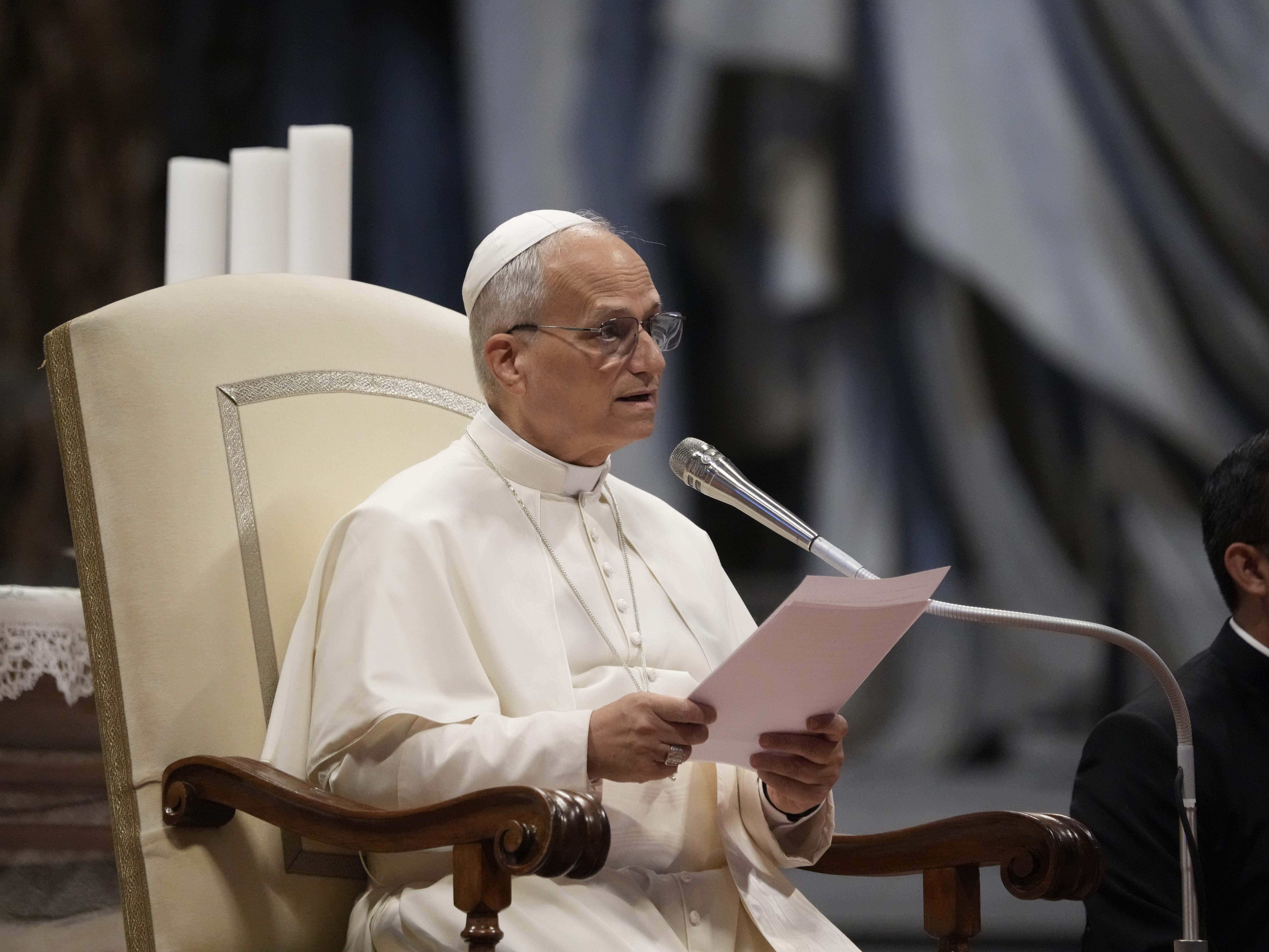 caption: Pope Leo XIV attends a meeting with jubilee pilgrims from the Italian region of Umbria in St. Peter's Basilica at the Vatican, Saturday, Sept. 13.