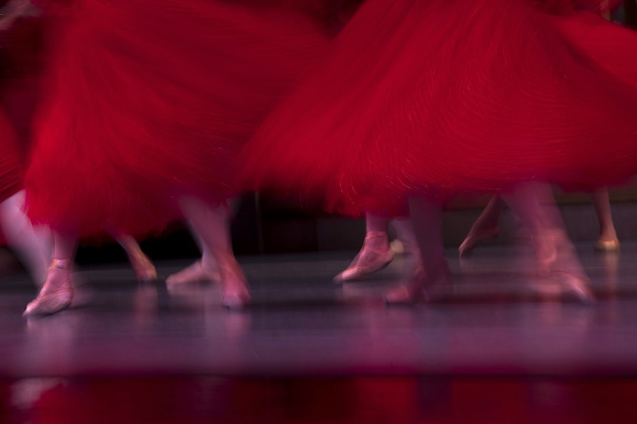 caption: Dancers perform a scarlet clad waltz during a dress rehearsal of Cinderella on Thursday, January 30, 2019, at McCaw Hall in Seattle.