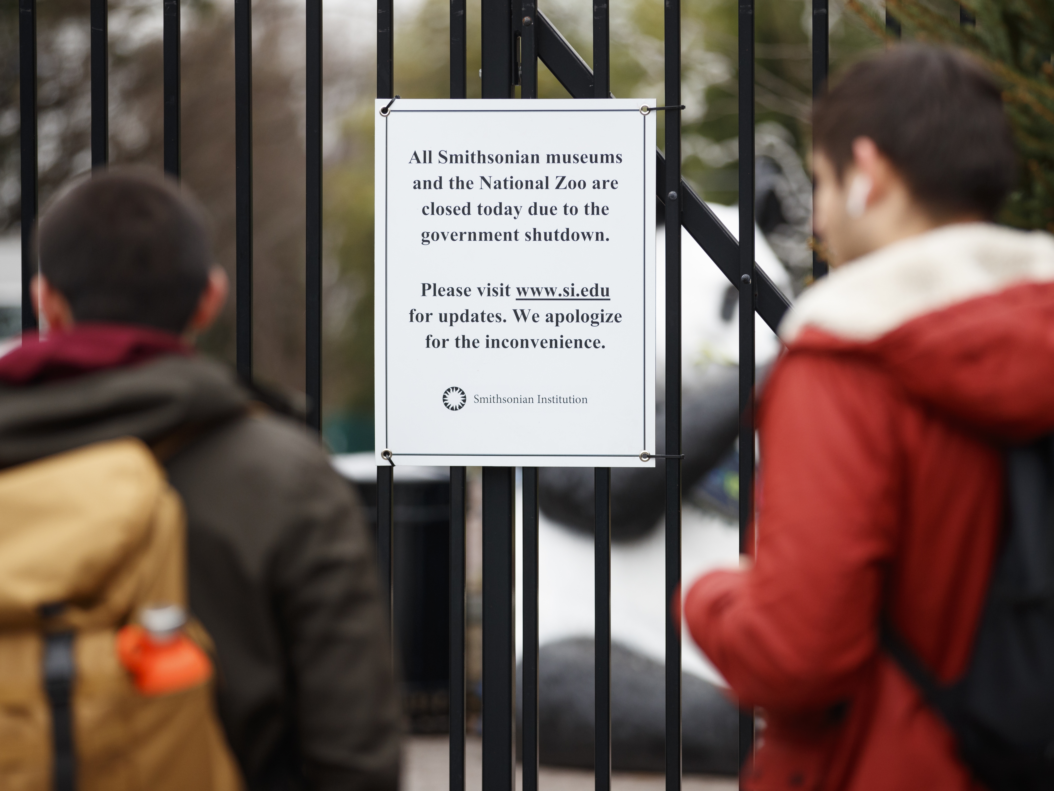 caption: A sign posted outside the National Zoo earlier this month declares its closure, along with the closure of all Smithsonian museums. They were all on the wish list for Jill Rorem, whose family plans were undone by the shutdown. But she's not alone: The shutdown's ramifications on the arts have been felt far beyond the Beltway.