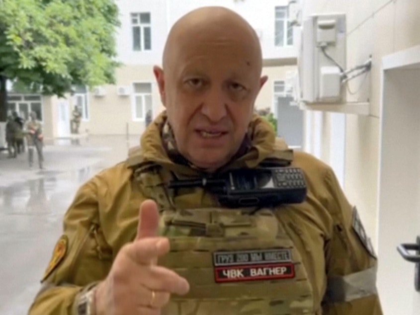 caption: In this handout photo taken from video released by Prigozhin Press Service, Yevgeny Prigozhin, the owner of the Wagner Group military company, records his video addresses in Rostov-on-Don, Russia, Saturday, June 24, 2023.