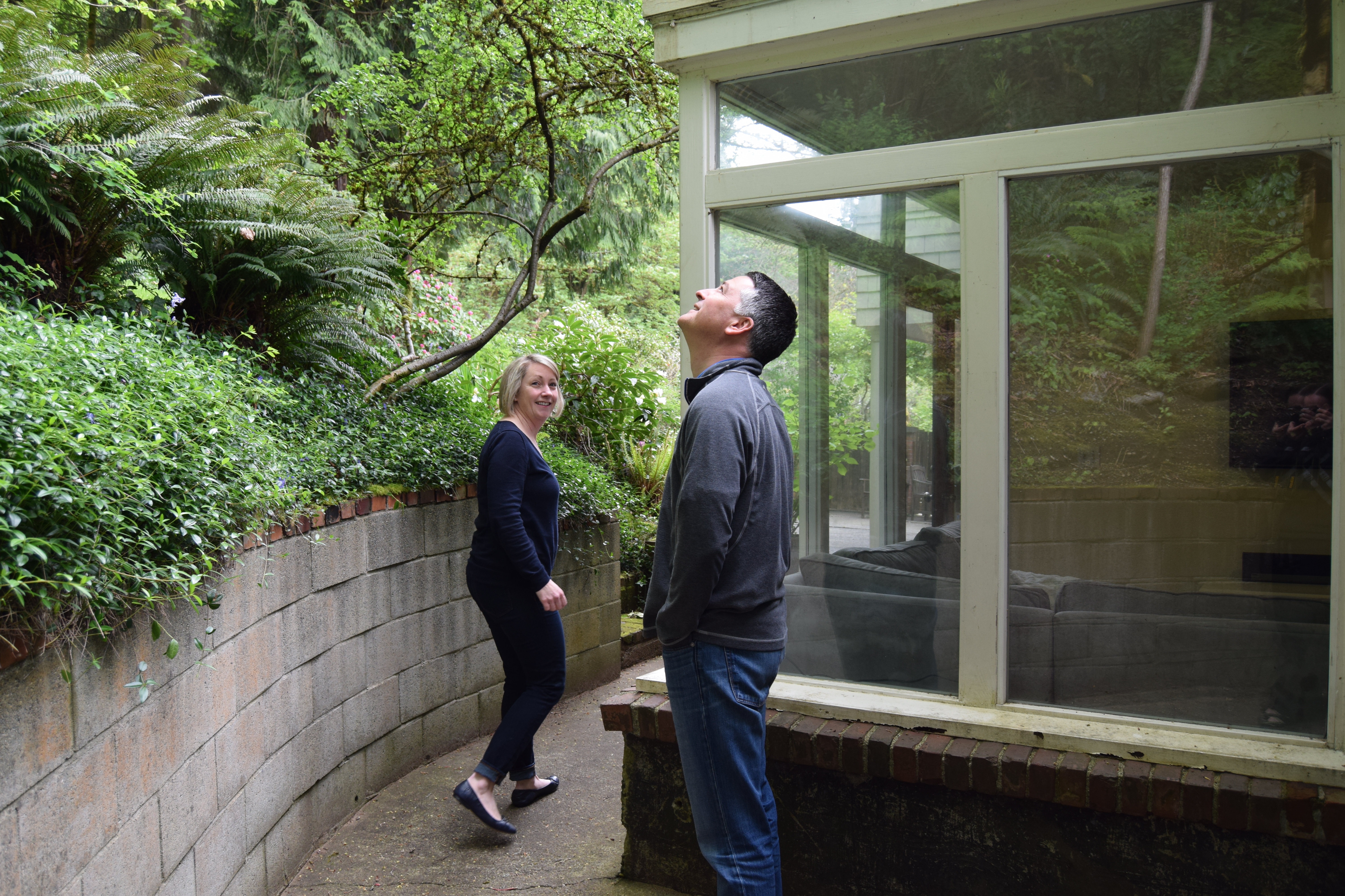 caption: Lisa and Jim Crisera were embroiled in a bureaucratic quagmire over this one small corner of their house, which they found out was on Seattle Parks land.