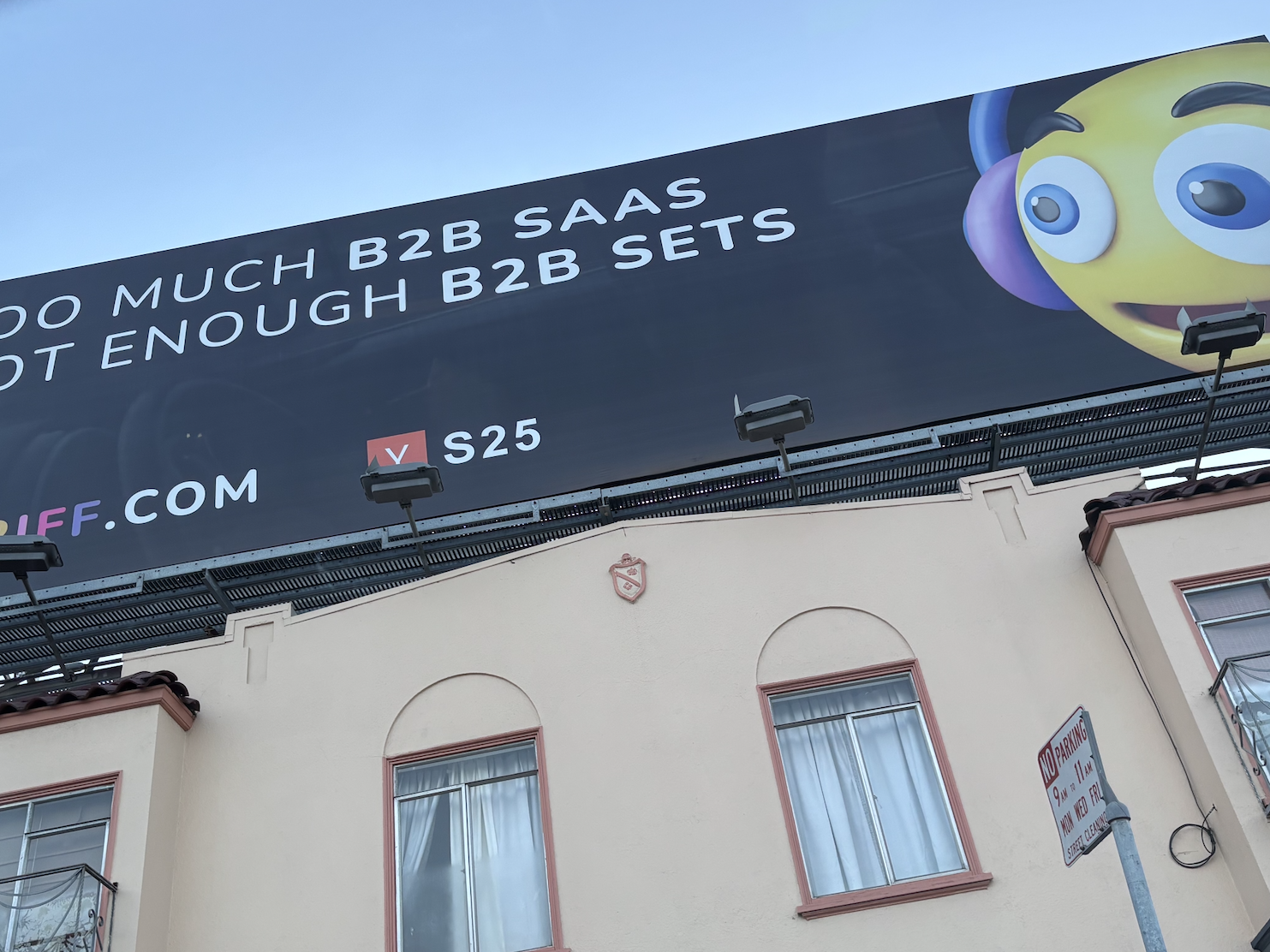 caption: Cryptically-worded billboards, such as this one in San Francisco's Mission District, have been springing up all over the city in the past year or two. They are intended to be understood only by a small audience.