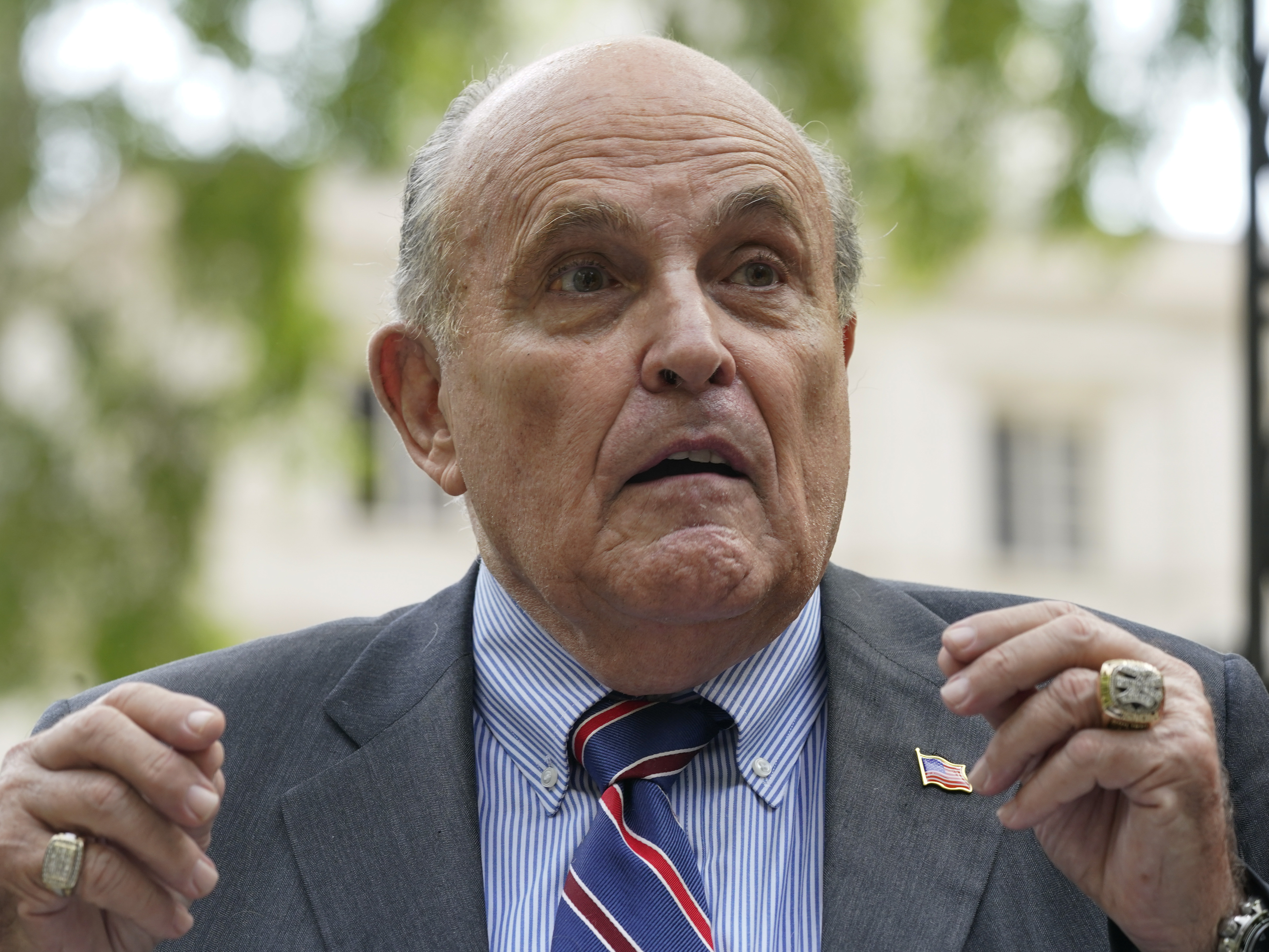 caption: Former New York City mayor Rudy Giuliani speaks during a news conference on June 7, 2022, in New York. Giuliani's lawyer says prosecutors in Atlanta have said Giuliani is a target of their criminal investigation into possible illegal attempts by then-President Donald Trump and others to interfere in the 2020 general election in Georgia.
