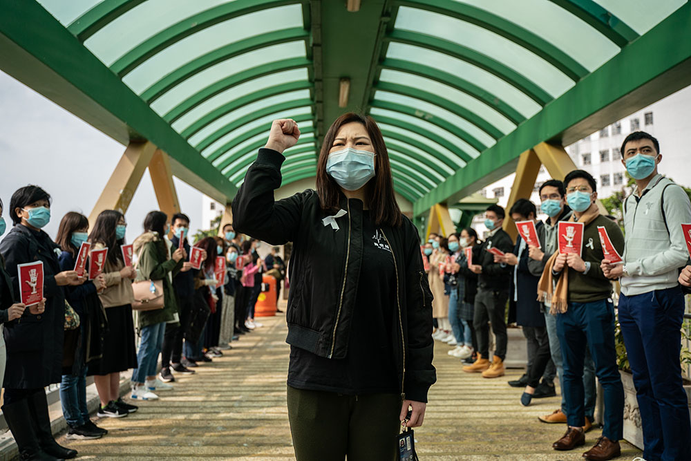 caption: Medical workers hold a strike near Queen Mary Hospital to demand the government shut the city's border with China to reduce the spread of the coronavirus on February 3, 2020 in Hong Kong, China. (Anthony Kwan/Getty Images)