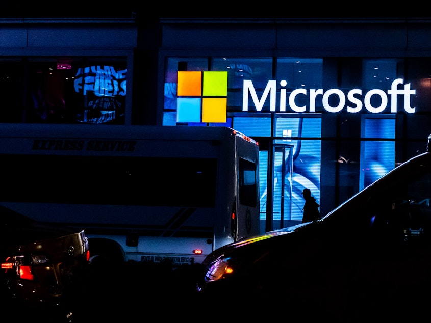 caption: Microsoft announced Monday that it will acquire ZeniMax Media, the parent company of popular video game publisher Bethesda, for $7.5 billion. Here, a Microsoft store is shown in March in New York City.