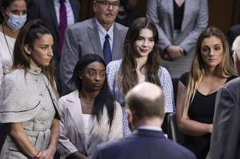 caption: U.S. Olympic Gymnasts Aly Raisman, Simone Biles, McKayla Maroney and NCAA and world champion gymnast Maggie Nichols testified on Capitol Hill in 2021 about the Inspector General's report on the FBI handling of the Larry Nassar investigation of sexual abuse of Olympic gymnasts.