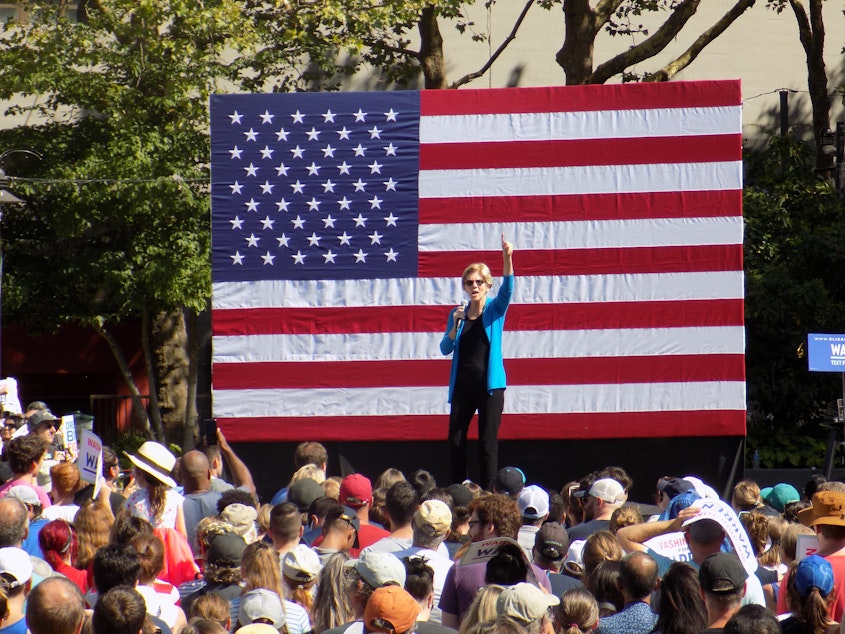 caption: Massachusetts Senator Elizabeth Warren (D) at a campaign town hall at Seattle Center on Sunday, August 24th.
