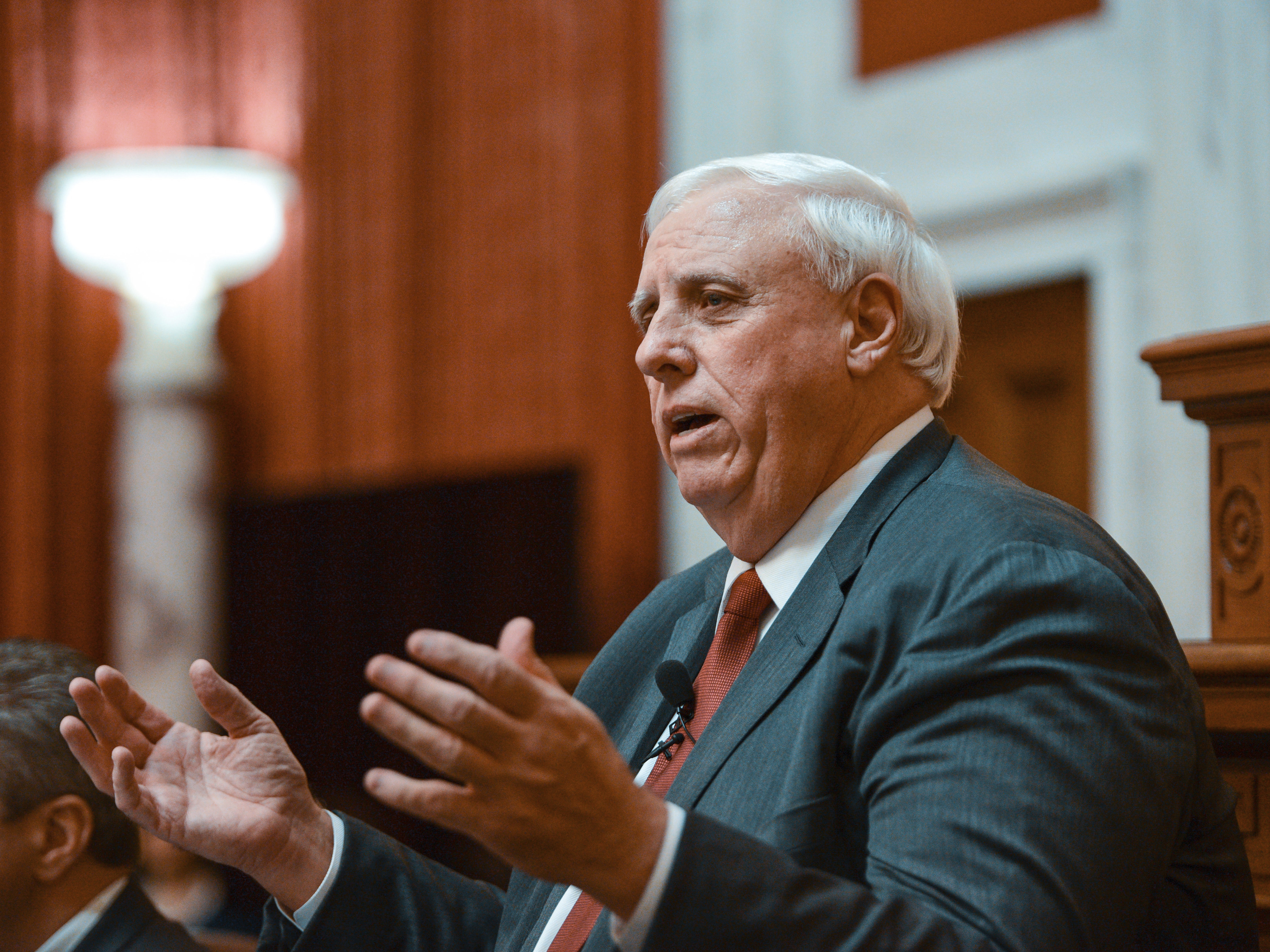 caption: West Virginia Gov. Jim Justice delivers his State of the State speech on Jan. 9, 2019, in Charleston, W.Va. Mining companies belonging to the Justice family owe millions in safety violations.