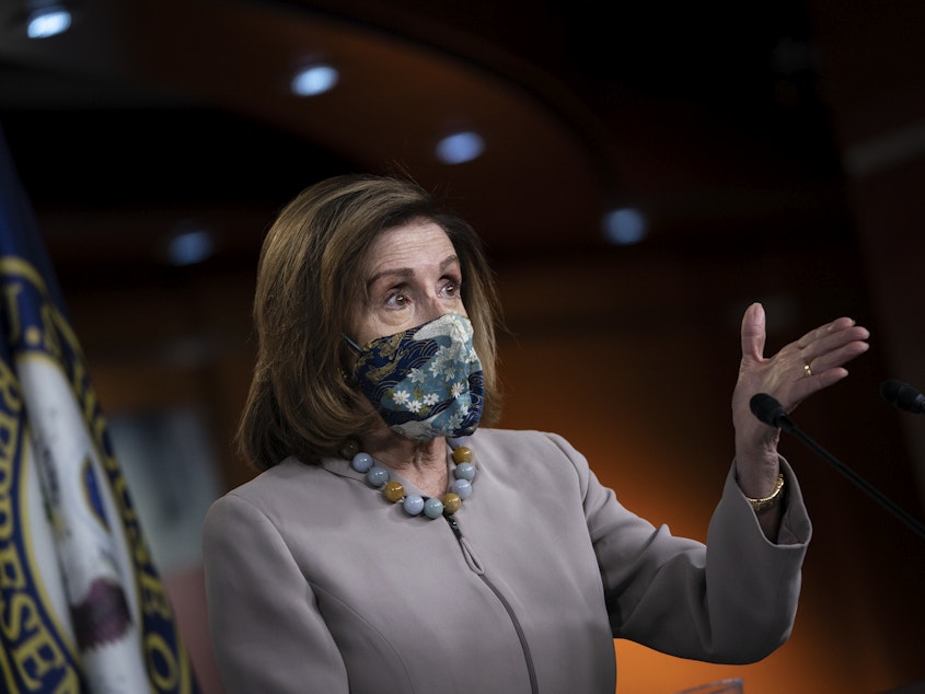 caption: Speaker of the House Nancy Pelosi, pictured on Dec. 10, led her chamber in a vote to override President Trump's veto of the annual defense bill on Monday.
