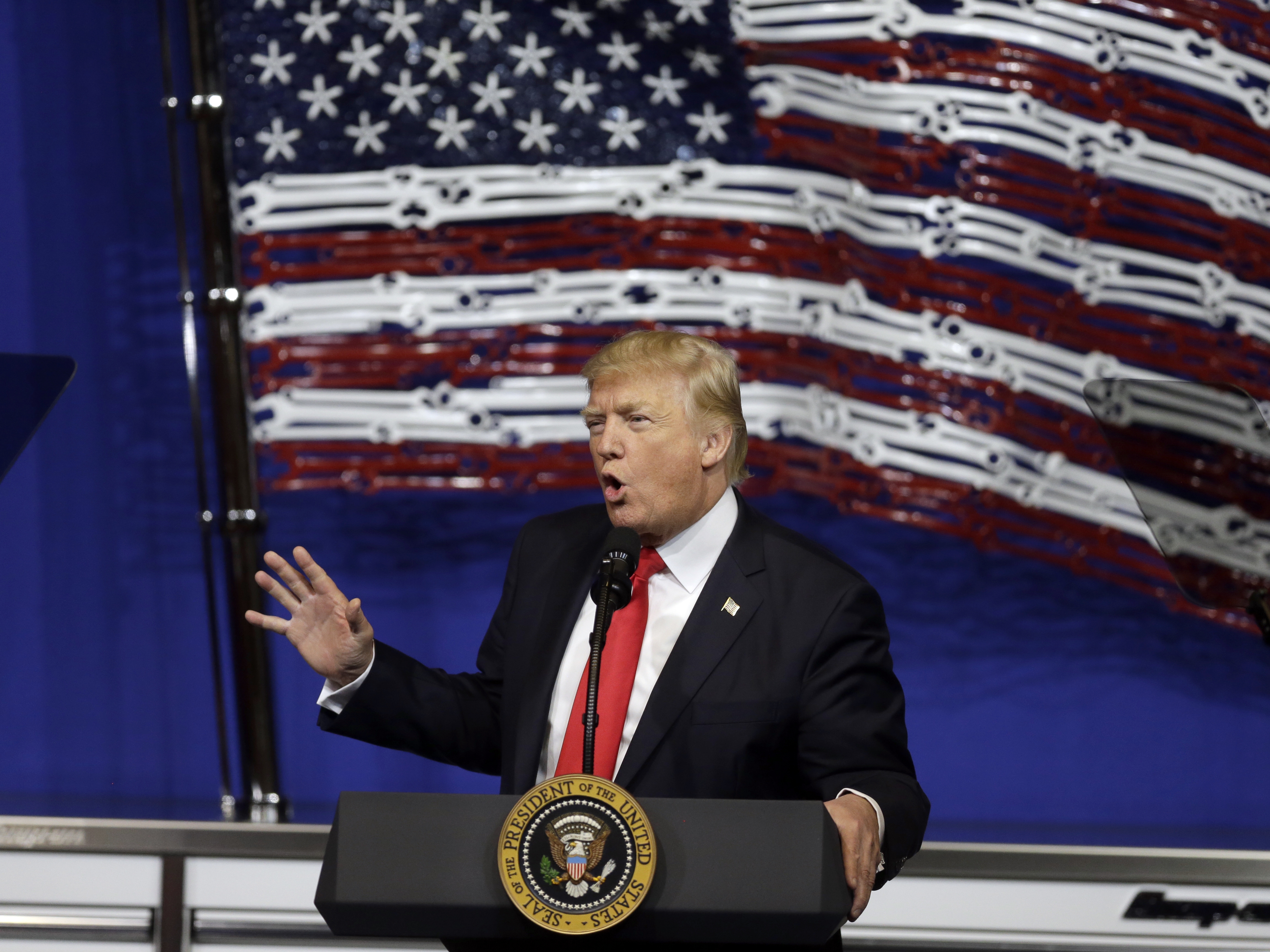 caption: President Donald Trump speaks at Snap-on tools, April 18, 2017, in Kenosha, Wis.
